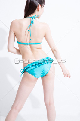水着姿の女性の背中 ストックフォトの定額制ペイレスイメージズ
