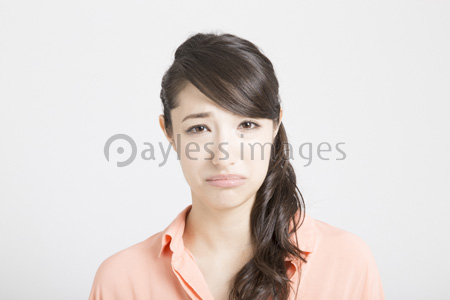 悲しい表情の女性 ストックフォトの定額制ペイレスイメージズ