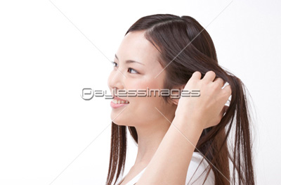 髪をなびかせる女性 ストックフォトの定額制ペイレスイメージズ